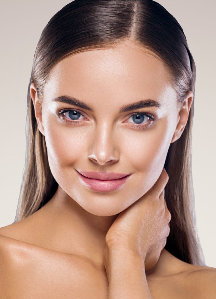 Female beautiful face eyes and smile spa concept